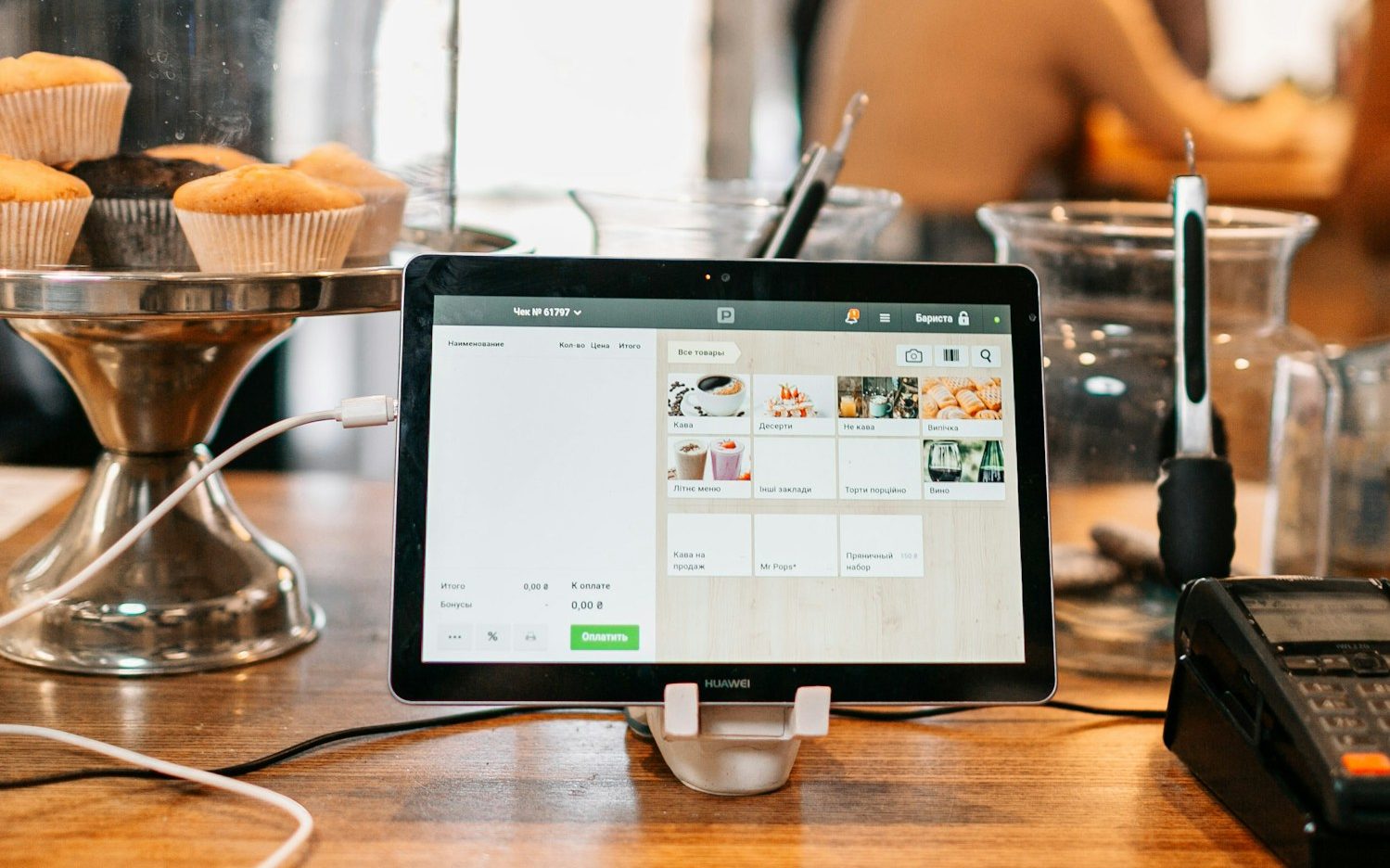 silver ipad on brown wooden table